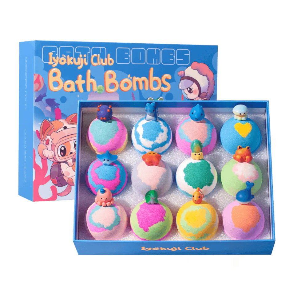 Box of colorful bath bombs with 'Kykaji Club' branding on a white background