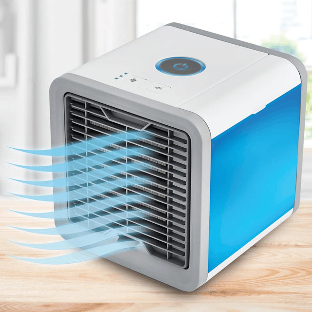 Portable air conditioner on a wooden surface with a blurred background