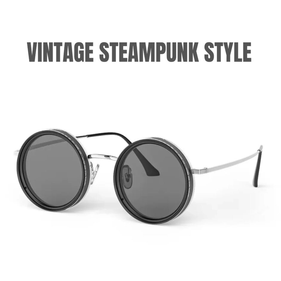 Vintage steampunk style sunglasses with round lenses on a white background