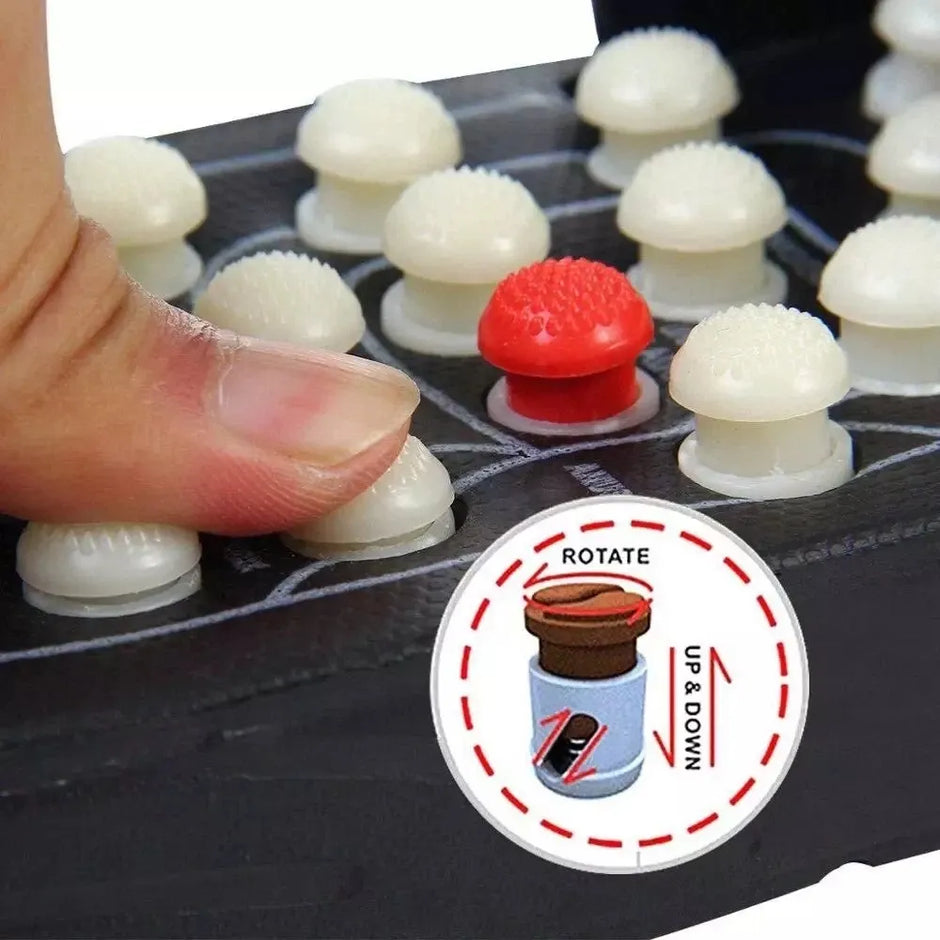 Hand interacting with a board game piece and a red and white piece on a black board.