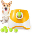 Dog next to a yellow and white ball launcher with tennis balls on a white background