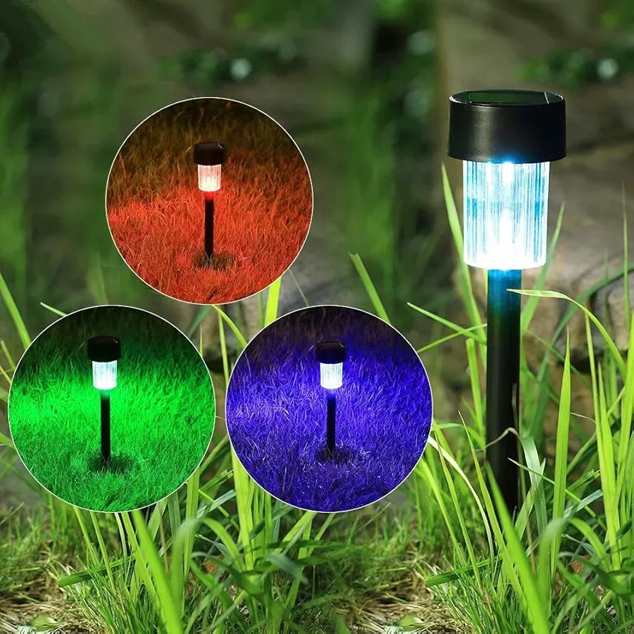 Solar-powered garden light with color-changing capabilities in grass