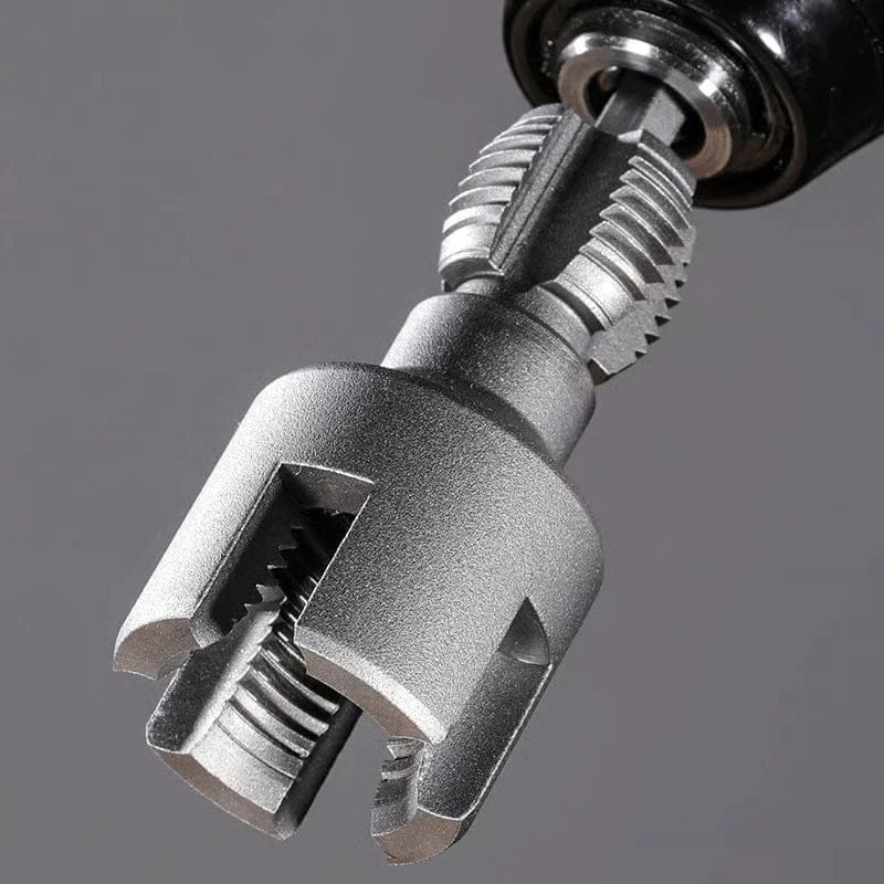 Close-up of a metal drill bit on a gray background