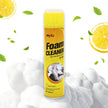 Foam cleaner spray can with lemon slices and leaves on a white background
