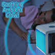 Person sleeping with a device emitting a blue glow labeled 'Soothing Ambient Glow'.