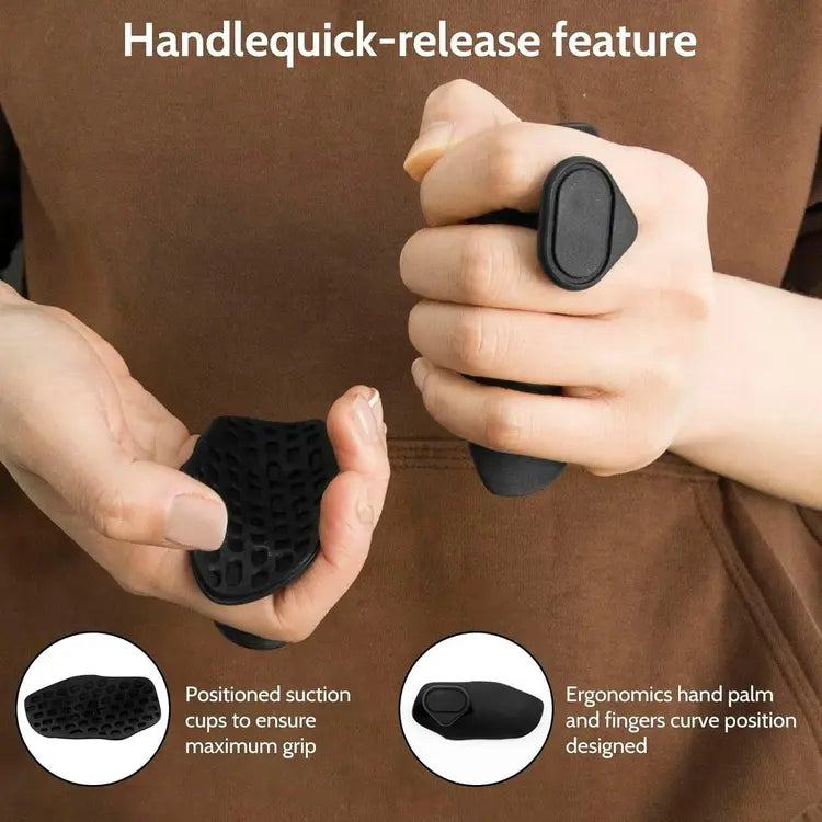 Person holding a black quick-release handle with ergonomic design and suction cups.