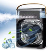 Portable air conditioner with fan blades and ice cubes on a blue sky background