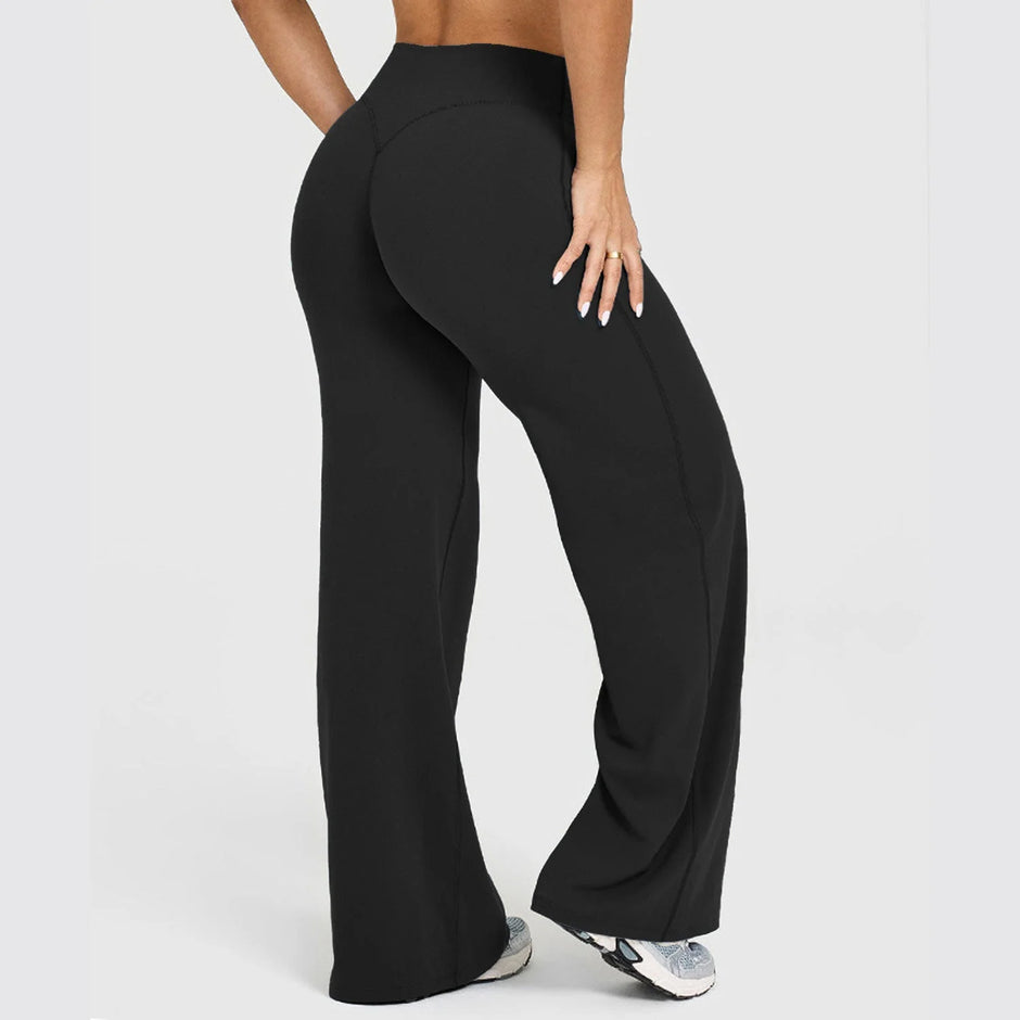 Black wide-leg pants worn by a person on a white background