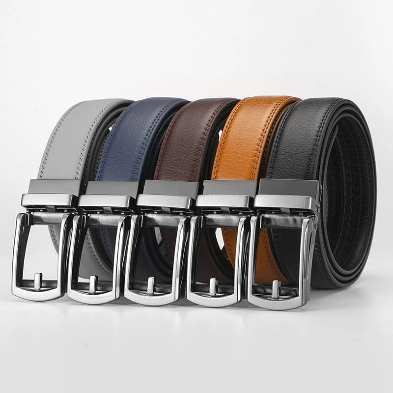 Set of five leather belts with silver buckles on a light gray background