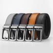 Set of five leather belts with silver buckles on a light gray background