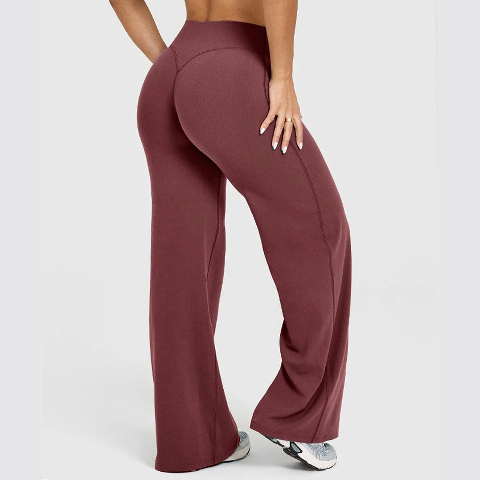 Maroon wide-leg pants worn by a person on a white background