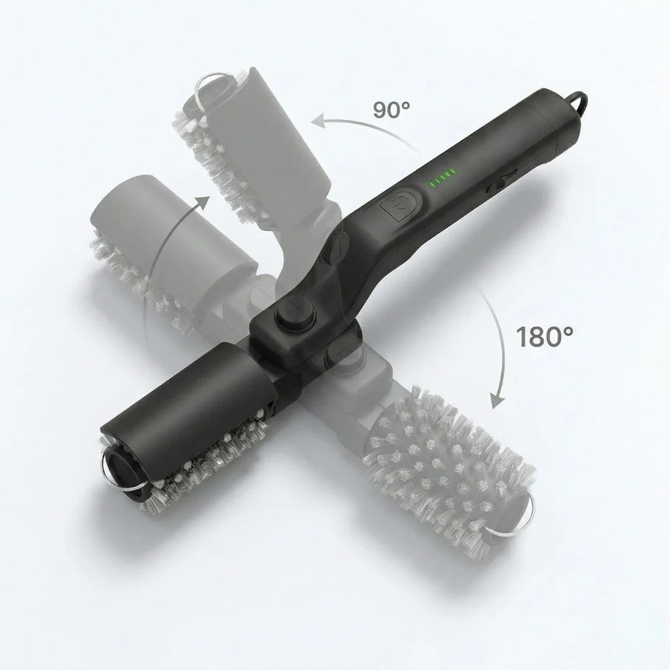 Black grooming tool with brush attachments on a white background