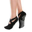 Black yoga socks with white patterns on a white background