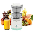 Juicer with a glass of orange juice and various fruits on a white background