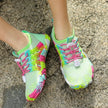 Colorful running shoes on a textured surface