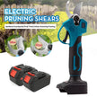 Electric pruning shears with two batteries on a white background