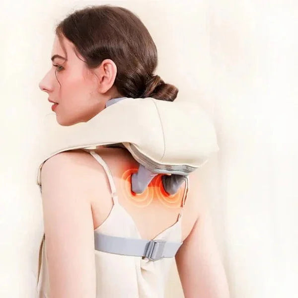 Woman using a neck and shoulder massager with glowing orange lights on a plain background