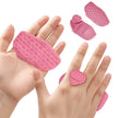 Pink silicone finger and hand exercisers on a white background