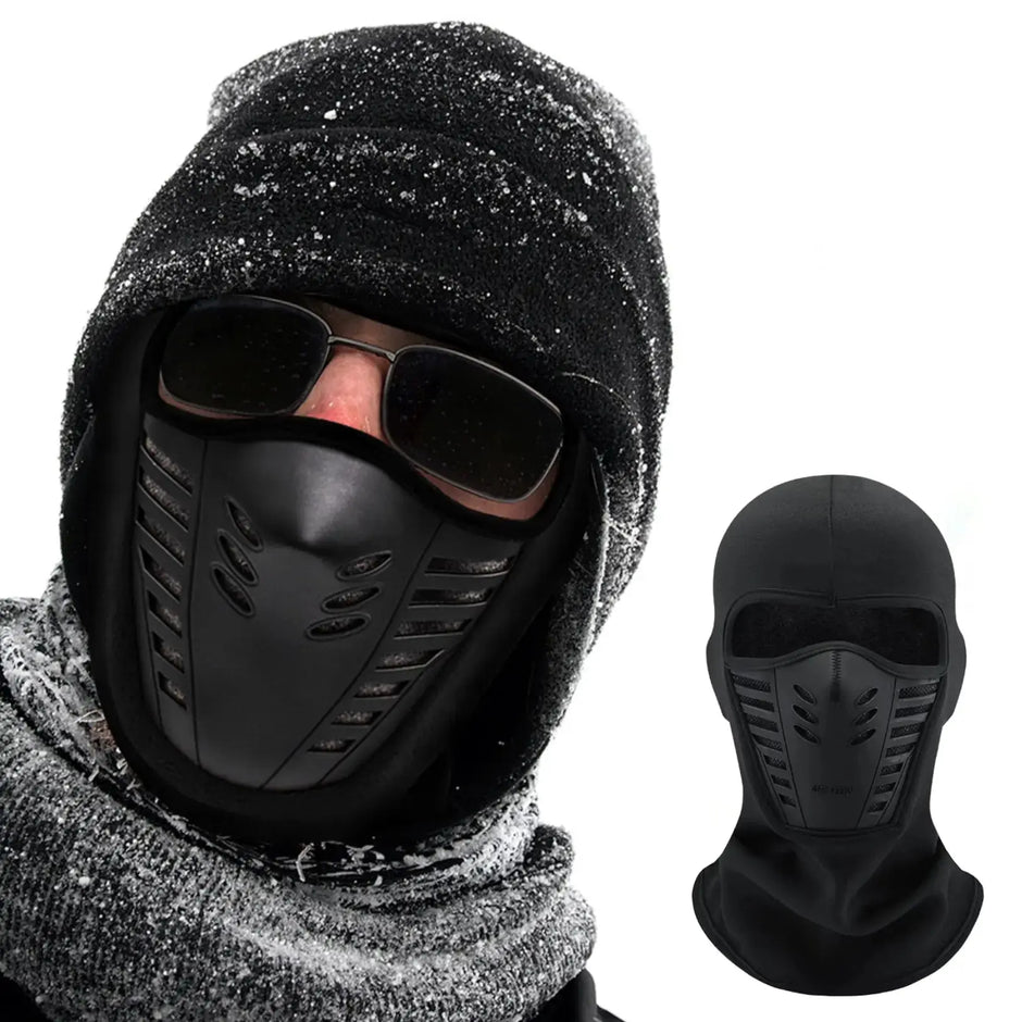 Black balaclava with face mask worn by a person in cold weather, with sunglasses inside.