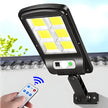 Solar flood light with remote control on a clear background