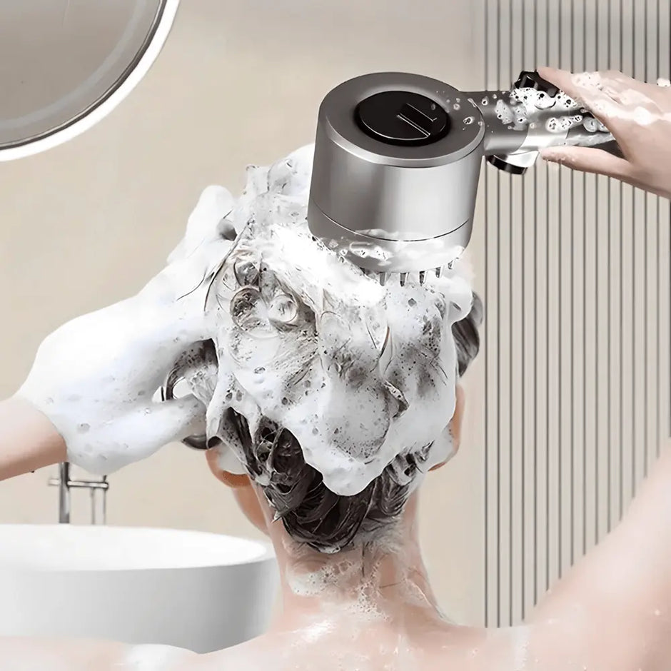Person using a handheld showerhead with soap suds in a bathroom setting