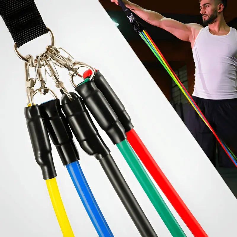 Resistance bands with colorful handles on a white background, with a person exercising in the background.