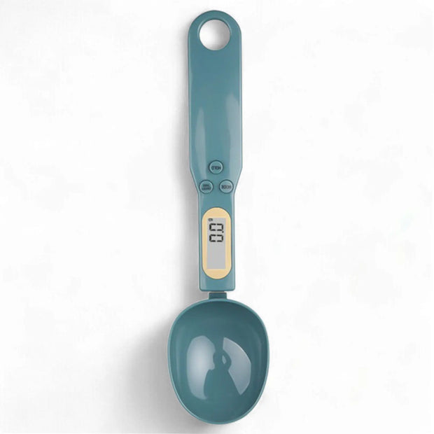 Teal digital measuring spoon on a white background