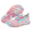 Pair of pink and blue water shoes on a white background