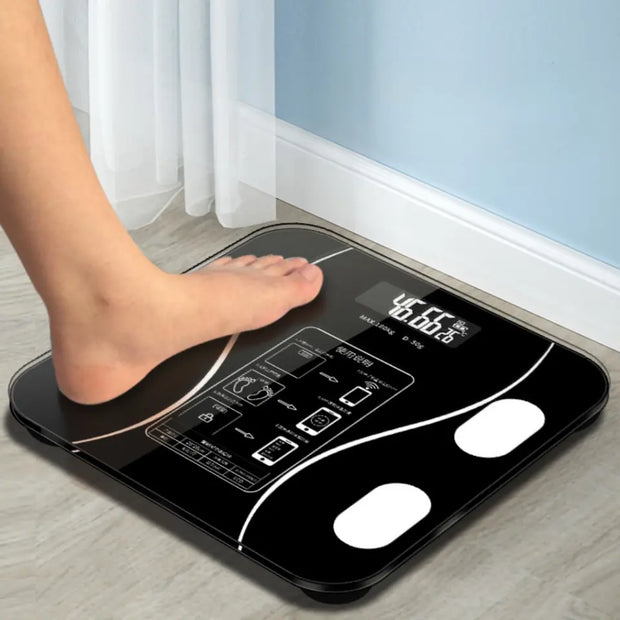 Person stepping on a digital (body fat scale) with a light blue wall and white curtains in the background.