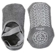 Gray yoga socks with patterned sole and brand logo on a white background