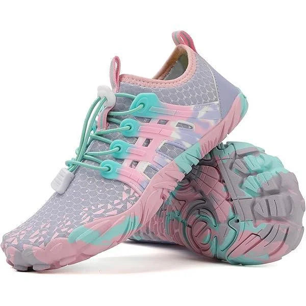 Pair of pink and gray sneakers with teal accents on a white background