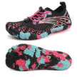 Colorful water shoes with black sole on a white background