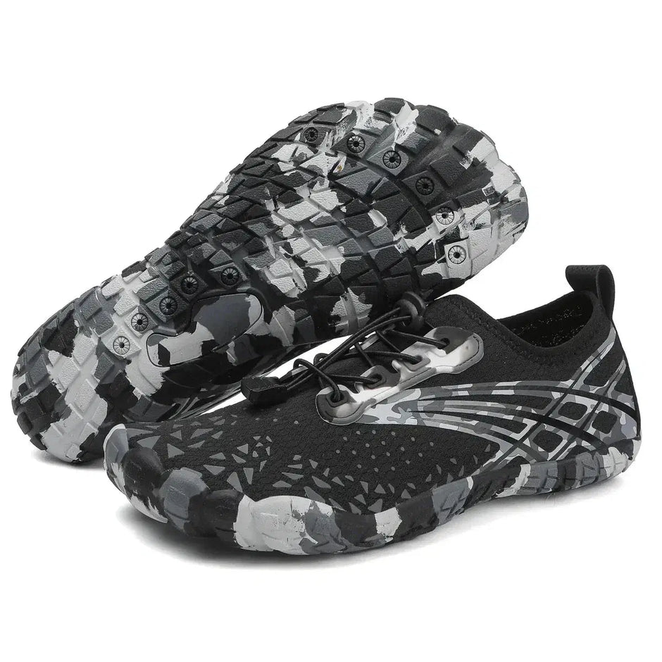 Black and gray camouflage shoes on a white background