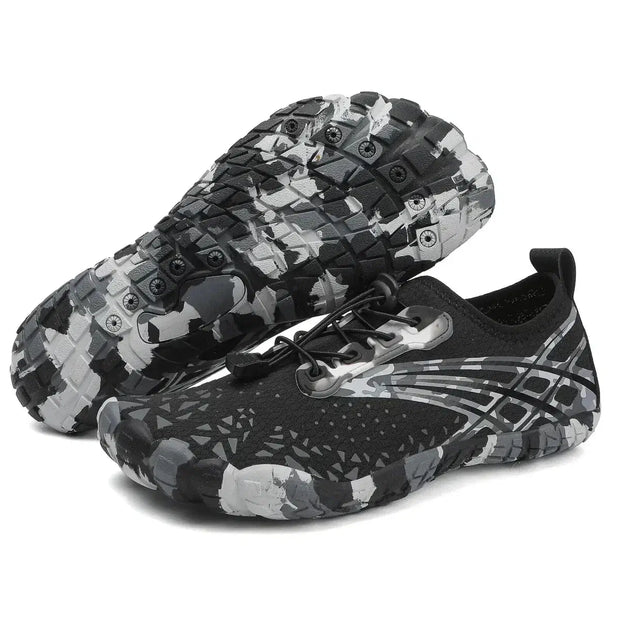Black and gray camouflage shoes on a white background