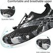 Black and gray athletic shoe with spandex fabric and anti-collision toe design, on a white background.