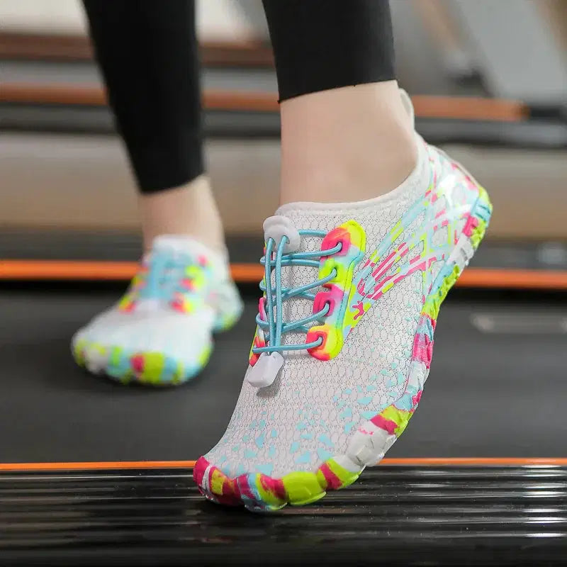 Colorful running shoes on a treadmill