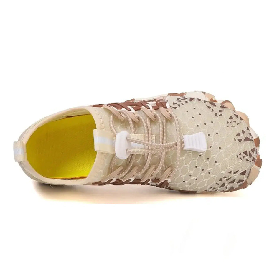Camouflage-patterned sneaker on a white background