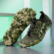 Camouflage-patterned sneakers on a reflective surface with a light green background
