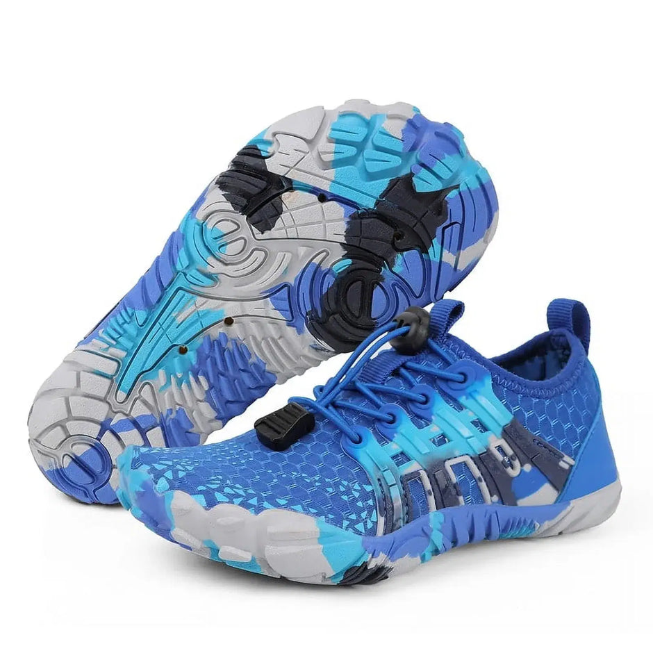 Blue and gray athletic shoes on a white background
