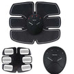 Black electronic muscle stimulator device with control panel on a white background