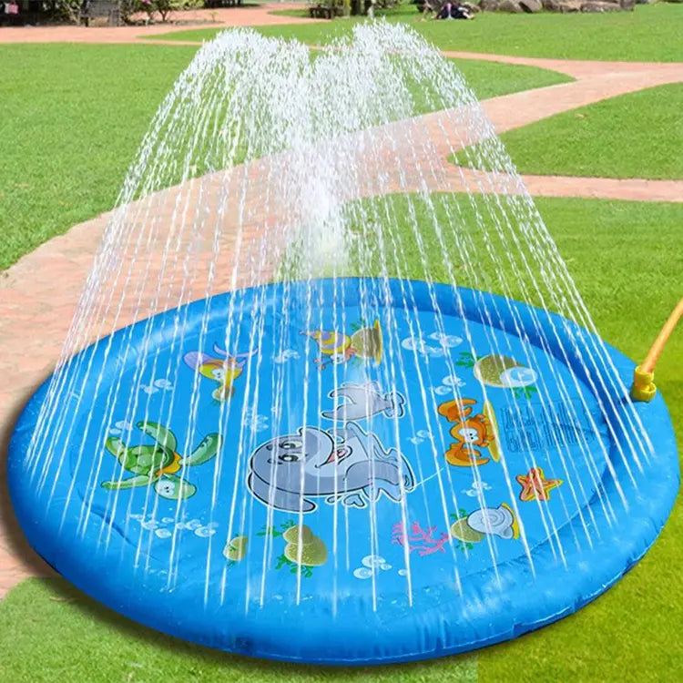 Blue inflatable sprinkler pad with water spraying on a grassy area