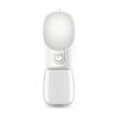 White handheld device with a light on a white background