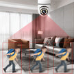 Security camera in a living room with red lines indicating detection area, showing a child running.