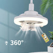 Ceiling fan with light fixture and remote control on a blue wall background