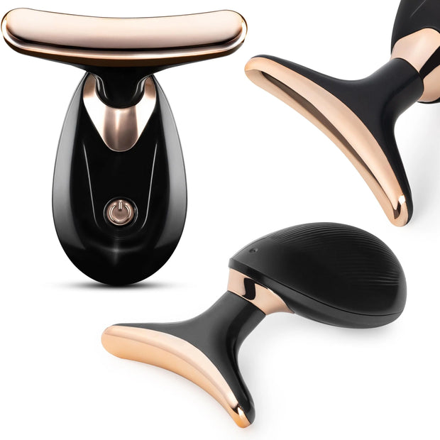 Black and rose gold facial massager on a white background