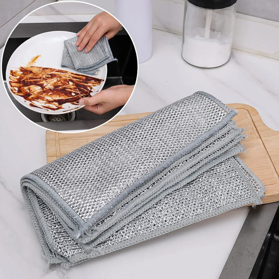 Gray microfiber cloth on a kitchen counter with a close-up of cleaning a plate.