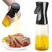 Oil sprayer being used to drizzle oil over a plate of steak and vegetables.