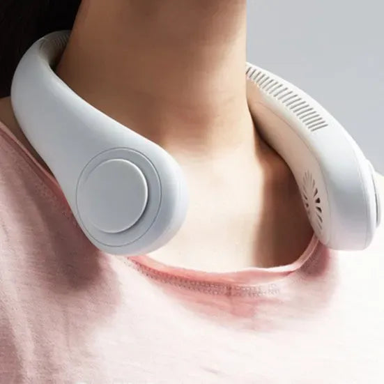 Neck massager being used on a person's neck