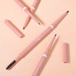 Pink eyebrow pencils with black tips on a peach background