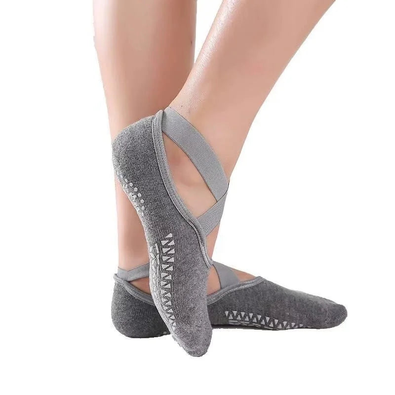 Gray ballet-style socks with a strap on a white background